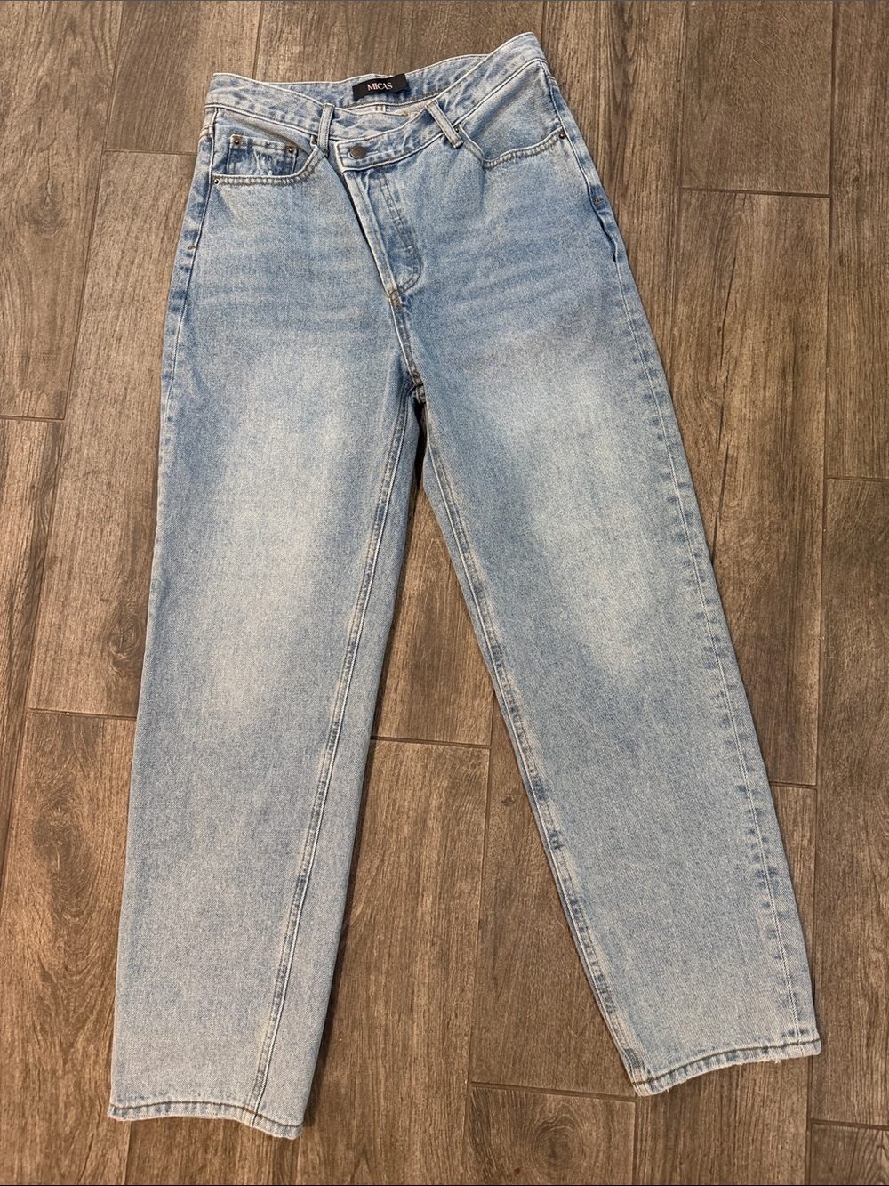 MICAS asymmetrical crossover-waist wide-leg denim jeans Light Wash
